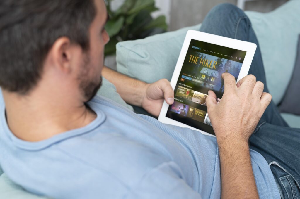 Man using the best Android tablet for gaming with a digital assistant on a tablet