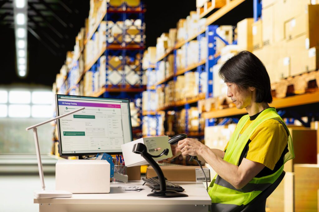 Supplier scanning packages in warehouse showing how dropshipping business fulfillment works